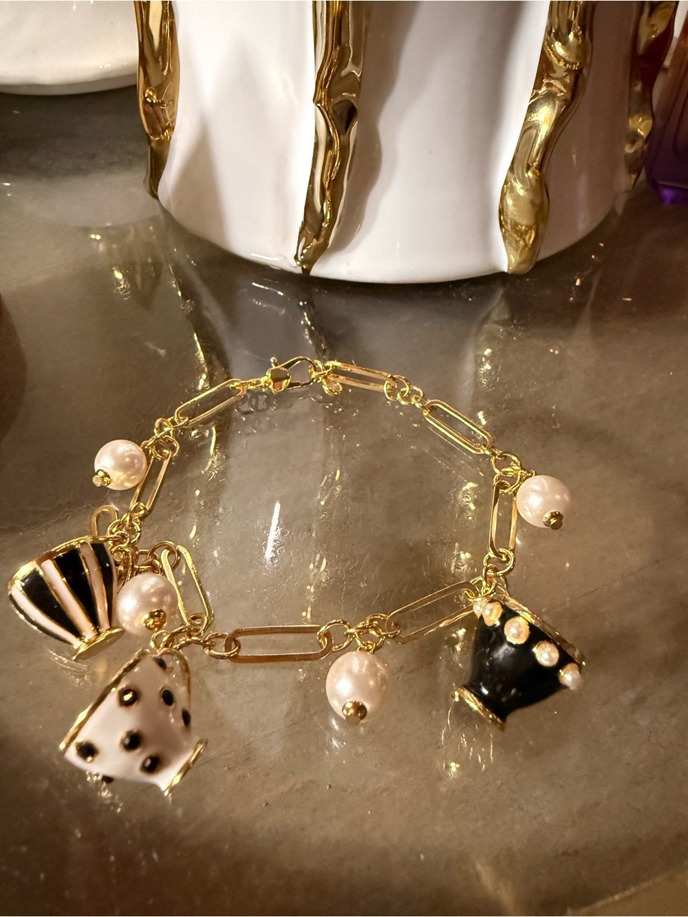 kate spade Gold Charm Bracelet with Black & White Teacup Charms and Pearl Drops